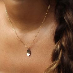 With a hammered oval charm pendant on our Narrow Links chain, the Olivia Necklace adds a touch of whimsy to any outfit. Want to create a set?! Pair this piece with our bestselling Olivia Ring! DETAILSPendant measures at 0.8"Available in 14", 16", or 18"Available in 14k Gold FillHypoallergenic, Nickel-Free, and Water Safe 14k Gold Filled Oval Minimalist Jewelry, Minimalist 14k Gold Filled Oval Jewelry, Delicate Oval Tarnish Resistant Jewelry, Minimalist Oval Recycled Gold Jewelry, Delicate Oval Tarnish-resistant Jewelry, Dainty Oval Jewelry With Cable Chain, Dainty Oval Cable Chain Jewelry, Delicate Oval 14k Gold Chain Jewelry, Everyday Delicate Oval Chain Jewelry