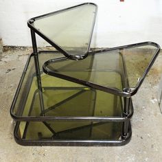 three glass trays stacked on top of each other