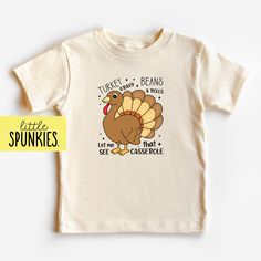 Vintage Turkey Shirt, Turkey Gravy Beans Rolls Let Me See That Casserole Kids Shirt, Fall Foods, Toddler Natural Tee PRODUCTION TIME Little Spunkies from the designer/owner of Spunky Pineapple Co https://www.etsy.com/shop/SpunkyPineappleCo   All baby and toddler clothes are 100% designed and printed with water based ink. All orders placed before 12:00 pm EST are shipped out same day (Monday - Friday). Orders received after noon are shipped out the next business day. ONESIES® BRAND Made from 100% Cotton. We print on Onesies® Brand. T-SHIRT Made from 100% Cotton. These run true to size. If you are in between sizes we suggest sizing up. ADULT T-SHIRT Made from 100% Cotton. WOMEN For a relax fitting tee order the size you normally wear. If you would like a more fitted look then order a size do Little Turkey Thanksgiving Shirt, Baby Turkey Shirt, Little Turkey Shirt, Its All Gravy Baby Shirt, Turkey Rolls, Funny Fall, Fall Foods, Turkey Shirts, Turkey Gravy