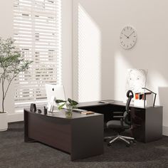 an office cubicle with two computer monitors and a desk in front of a window