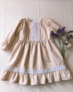 Vintage, handmade with beige fabric and white lace. 100 % cotton fabric. Very comfy for your baby to wear. Cute and protective as well. Protective from wind.  *Comes in sizes 0-3 months and older, up to 4 years old Handmade in the USA *IF YOU BUY SET, you get $3.50 OFF!! Beige Dress, Beige Dresses, Beige Fabric, Blue Polka Dots, Baby Wearing, Girls Clothing, 3 Months, Cotton Dresses