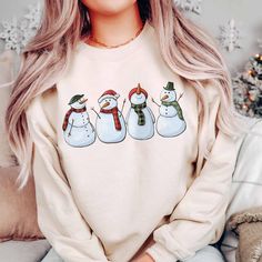 Celebrate the Season in Style with our Christmas Print Sweatshirt! Perfect for cozy holiday gatherings or a heartwarming gift, it’s the festive flair you need. Limited Edition – Grab yours before it’s gone! Cute Winter Holiday Sweatshirt, Cute Sweatshirt For Holiday Winter, Winter Crew Neck Tops As Gifts, Cute Winter Tops As Gift, Cozy Christmas Tops With Relaxed Fit, Cute Winter Tops As A Gift, Cozy Relaxed Fit Christmas Tops, Winter Holiday Relaxed Fit Tops, Winter Holiday Tops With Relaxed Fit