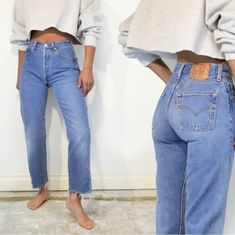 Vintage Levi's 501 jeans. 1990s. Straight leg. High waist. Button fly. 100% cotton. Tag: 28 x 36. Actual waist: 26" DETAILS ------- Classic 501s in stunning blue, typically a wash of this color has more texture, but this pair is a gentle blue throughout. Really stunning. Best patina in legs, with hems chopped into raw edge. MEASUREMENTS ------- Waist: 26" High hip: 33" Low hip: 39" Thigh: 21.5" Rise: 10.5" Inseam: 25.5" (cropped) Levi’s Womens Jeans, Highwaist Jeans Outfit, 501 Levis Women Outfits, Levis 501 Crop, Cropped Outfits, Highwaist Jeans, Levi 501s, Minimalist Fashion Men, 90s Fits