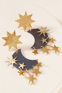 An inky patina moon serves as the perfect backdrop for golden celestial shapes. Sterling posts. Nickel and lead free. 3” [7.65 cm] long. Bubble House, Metalsmithing Jewelry, Bhldn Weddings, Color Crafts, Celestial Jewelry, Metal Crafts, Brass Jewelry, Acrylic Earrings, Cute Jewelry