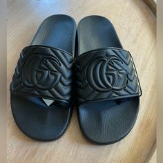 Brand New, Never Been Worn. Authenticed By Stock X Luxury Black Slide Sandals, Gucci Black Leather Sandals, Luxury Gucci Slides With Rubber Sole, Black Gucci Leather Sandals, Gucci Designer Slides With Cushioned Footbed, Designer Gucci Slides With Cushioned Footbed, Luxury Black Cushioned Slides, Designer Gucci Slides With Rubber Sole, Gucci Leather Slides