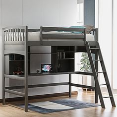 a bunk bed with a desk underneath it and a ladder to the top that leads up