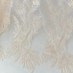 Width: 130cm, in inches: 51"The listing is for 1 yards.For more quantity, please feel free to convo me.If you like it, order it now.Perfect choice for a touch of ador for wedding gown / bridal dress decor, bodice , wedding dress applique, bridal headpiece applique, evening gown applique, sash applique, wedding cale candle applique , bridal accessories ,wedding projects. llhttps://www.etsy.com/shop/beautyfabric Diy Doll Dress, Gown Applique, Wedding Cales, Doll Dresses Diy, Veil Headband, Sequin Mesh Dress, Flower Luxury, Wedding Dress Material, Dress Applique