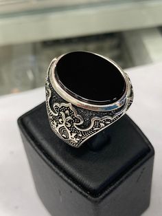 It is a carefully crafted product made of 925 sterling silver. Luxury Silver Onyx Signet Ring, Silver Onyx Signet Ring Luxury Style, Silver Onyx Signet Ring With Polished Finish, Luxury Silver Signet Ring With Onyx, Classic Onyx Ring Jewelry, Classic Onyx Ring, Classic Onyx Open Ring Jewelry, Silver Onyx Gemstone Signet Ring, Silver Onyx Signet Ring Gift