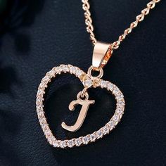 DescriptionDetails:Available in Stainless Steel or Stainless Steel with Gold PlatingIt does NOT Tarnish Or Rust (100% guaranteed)FREE Gift Boxing Included! Your personalized pendant takes time to hand craft and test but when you're wearin... Custom Pendant Necklace, ليلو وستيتش, Name Initials, Initial Pendant Necklace, 26 Letters, Custom Pendants, Letter J, Heart Shape Pendant, Girls Necklaces