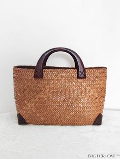 BagForLove - Artisanal Straw Beach Bag: Retro Rattan Weaving, Handmade for Simplicity and Style Product Description Color Brown Pattern Type Colorblock Bag Size Small Type Top Handle Bag Material Straw Size Chart INCH CM Bag Length Bag Width Bag Height Handle Height 11.8 inch 4.3 inch 8.7 inch 2.8 inch Bag Length Bag Width Bag Height Handle Height 30 cm 11 cm 22 cm 7 cm Details Pictures Similar Products h2 { text-align: center; } /* æ¢è¡ */ li{ white-space: normal; word-break: break-all; word- Brown Basket Bag With Open Weave, Brown Basket Beach Bag With Open Weave, Eco-friendly Brown Bag With Open Weave, Brown Open Weave Basket Beach Bag, Brown Open Weave Top Handle Bag, Brown Open Weave Natural Fiber Bags, Eco-friendly Brown Crochet Bag With Woven Leather, Brown Rectangular Woven Leather Beach Bag, Traditional Rectangular Vacation Bag