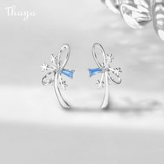 Embrace the elegance of winter with our Winter Snowflake Earrings, each symbolizing uniqueness and beauty. Add a touch of grace to your outfit with these fashionable accessories inspired by the winter wonderland.   - Brand: Thaya  - Material: 925 Silver  - Size: 12*20mm  - Weight: 1.7g  - Style: Snowflake  - Gender: Women's Fashionable Accessories, Grace To You, Snowflake Earrings, Winter Snowflakes, Couple Gifts, Sales Gifts, Jewelry Care, The Winter, Winter Wonderland