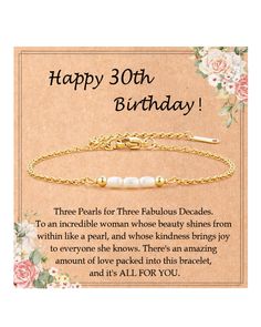 a happy 30th birthday card with a gold chain bracelet and pearls on the clasps