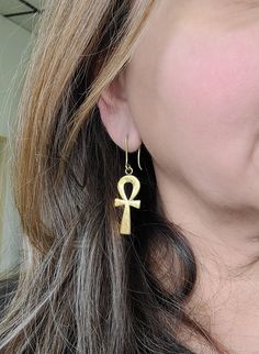 Beautiful everyday earrings meant to bring luck. The Ancient Egyptian "Ankh" symbol means "Key of Life". Ankh pendant and hook is brass, pierced. Nickel-free Ankh Gold Earrings, Ankh-shaped Metal Earrings For Gift, Ankh Shaped Metal Earrings For Gift, Symbolic Nickel-free Drop Plug Earrings, Nickel-free Ankh Elegant Jewelry, Nickel-free Ankh Shaped Elegant Jewelry, Nickel-free Symbolic Drop Plug Earrings, Nickel-free Ankh Jewelry, Elegant Nickel-free Ankh Jewelry