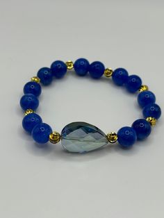 Blue jasper bracelet with accent beads. Blue jasper stone can create empowerment. It also lets you handle stressful situations calmly. Everyday Blue Stretch Bracelet With Gemstone Beads, Everyday Blue Gemstone Beads Stretch Bracelet, Everyday Blue Lapis Lazuli Beaded Bracelets, Hand-strung Blue Agate Bracelets, Casual Blue Stretch Bracelet With Gemstone Beads, Blue Casual Bracelet For Meditation, Blue Hand-strung Stretch Bracelet, Casual Blue Bracelet For Meditation, Elegant Blue Stretch Bracelet