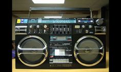 an old fashioned boombox is sitting on a table