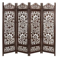 Add a hint of charm with this traditional 4 panel folding screen room divider in your home space. Providing function in a stylish way, these room dividers work double duty as privacy screens and standing against a wall as a large accent piece, or in the middle of a room to add some privacy and divided space, this room divider is too style to hide away. This item comes shipped in one carton. Suitable for indoor use only. Made in India. Features 4 carved screen panels. Traditional theme Color: One Temporary Room Dividers, Folding Screen Room Divider, Bamboo Room Divider, Sliding Room Dividers, Wood Room Divider, 4 Panel Room Divider, Wooden Room Dividers, Hanging Room Dividers, Divider Design