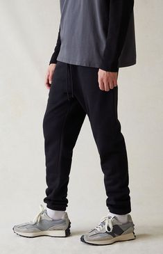 Sit back and relax in PacSun's new Black Sweatpants. These comfortable sweatpants are complete with a soft fleece lining, side hand pockets, a drawstring waistband, and elastic ankle cuffs.


	30" inseam
	Soft fleece lining
	Side hand pockets
	Drawstring waistband
	Elastic ankle cuffs
	Single back pocket
	PacSun woven label
	Stretchy
	60% cotton, 40% polyester
	Machine washable
	Model is wearing a size medium
	Model Measurements: 6'2” Height, 30" Waist, 37.5” Hips, 36.5&rdq Fleece Sweatpants With Elastic Waistband For Leisure, Athleisure Sweatpants With Elastic Waistband For Streetwear, Fleece Sweatpants With Ribbed Waistband For Leisure, Casual Joggers With Relaxed Fit And Straight Hem, Casual Relaxed Fit Joggers With Straight Hem, Everyday Cotton Sweatpants With Drawstring, Basic Sweatpants For Fall Streetwear, Casual Joggers With Ribbed Cuffs And Straight Hem, Comfortable Fleece Sweatpants With Elastic Waistband