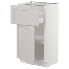 a white kitchen cabinet with the door open and drawers on each side, in front of a white background