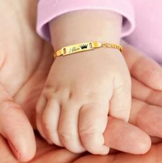 Discover the perfect keepsake with our Customized Name Bracelets for Infants, a thoughtful and enduring gift that celebrates those special early moments. Meticulously crafted from non-allergenic stainless steel, these baptism bangles are not only safe for sensitive skin but also exude a timeless elegance. Key Features: Metals Type: High-quality Stainless Steel, known for its durability and hypoallergenic properties. Length: Adjustable from 12 to 15 cm, ensuring a comfortable and secure fit as your child grows. Personalization: Customize with your child's name, making it a unique and cherished item. Ideal for Special Occasions: Perfect for baptisms, birthdays, or as a family love gift, this bracelet serves as a beautiful symbol of affection and memory. Jewelry Care Instructions: To maintain Personalized Gold Nameplate Bracelet For Wedding, Classic Engraved Bracelets For Birthday, Classic Adjustable Name Bracelet For Birthday, Personalized Nameplate Gold Bracelet For Wedding, Adjustable Nameplate Gold Bracelet For Birthday, Adjustable Gold Nameplate Bracelet For Birthday, Engraved Bracelets For Birthday And Mother's Day, Classic Personalized Gold Bracelet Gift, Personalized Name Bracelet Gift