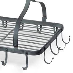 a metal basket with hooks hanging from it