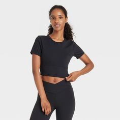 Upgrade your athleisure wardrobe with this Cropped Short-Sleeve Shirt from JoyLab™. Made from nylon and spandex, this short-sleeve shirt offers all-day comfort and allows easy movement. Tailored in an athletic fit, this cropped shirt pairs well with a variety of shorts, leggings and sweats for a sporty look. JoyLab™: A movement that’s always in motion. Moisture-wicking Short Sleeve T-shirt, High Stretch Short Sleeve T-shirt For Training, Fitted Short Sleeve Sports T-shirt, Athleisure Short Sleeve Crew Neck Top For Workout, Relaxed Fit Short Sleeve Tops For Workout, Relaxed Fit Short Sleeve Workout Tops, Sporty Short Sleeve Relaxed Fit Tops, Moisture-wicking Relaxed Fit Short Sleeve Tops, Solid Short Sleeve Sports Top