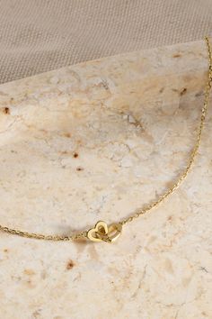 This 14k Gold Parker Heart Necklace’s solid gold interlocking heart design is meant to celebrate the bond between mothers, daughters, sisters and friends. heart necklace; trend; spring styling; summer aesthetic; vacation; travel; new adventures; shopping; fashion; chic; streetwear; styling; styling jewelry; gift ideas; mothers day gifts; gifts for her; gifts for mom; mother's day; interlocking necklace; gold heart jewelry; gift ideas Gold Heart Jewelry, Gift Ideas Mothers Day, Friends Heart, Styling Jewelry, Spring Styling, Earrings Stacking, Jewelry Product Shots, Chic Streetwear, Aesthetic Vacation