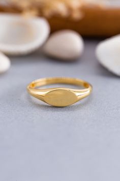 ★14K Solid Gold Oval Signet Ring, 925 Sterling Silver Oval Signet Ring, Personalization Ring, Mother's Day Gift, Valentine's Day Gift ★ ★ IMPORTANT SHIPPING & PRODUCTION DETAILS!! ★ RINGS: All rings are made to order at the selected size requested during checkout. I do not use a formula to determine ring sizing for wide bands (Unless noted within the listing) so if you select a size 6 and purchase 8-10 rings each ring will rest at the US ring size 6. All rings made at US ring sizes though you ma Tarnish Resistant Oval Stackable Rings In Fine Jewelry, Everyday Stackable Oval Rings With Polished Finish, Everyday Oval Stackable Rings With Polished Finish, Classic Oval Stackable Signet Ring, Stackable Oval Dome Ring, Oval Stackable Signet Ring For Anniversary, Everyday Oval Initial Ring Stamped 14k, Personalized Oval Minimalist Rings, Fine Jewelry Oval Stackable Rings As Gift