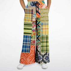 Introducing the Ginger Snap Boho Patchwork Eco-Poly Wide Leg Pants – a vibrant and stylish addition to your wardrobe. These eye-catching pants feature an eclectic mix of colorful patterns, perfect for making a bold statement. Made from durable Eco-Poly fabric, they offer a comfortable and sturdy feel. The elastic drawstring waist provides a customizable fit, while the hidden side seam scoop pockets add practicality without compromising on style. Due to its eclectic pattern and color mix, these p Ginger Snaps, Bell Bottoms, Ginger, Wide Leg Pants, Color Patterns, Wide Leg, Color Mixing, Color Pop, Summer Dresses