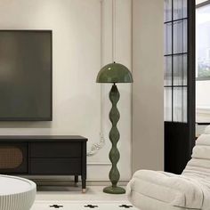 a large flat screen tv mounted to the wall in a living room