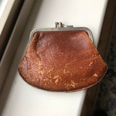 Such a cool old double-compartment coin purse! Made of leather & metal, the leather is wonderfully aged and the metal clasp has a patina of rust. Purse is 4-3/4 x 3-1/2 inches; circa 1910-20. Other items are not included. Visit my shop! www.veraviola.etsy.com Vintage Compact Wallet, Vintage Compact Wallets For Everyday Use, Vintage Style Compact Wallet For Everyday Use, Vintage Coin Purse For Everyday Use, Vintage Compact Coin Purse For Everyday, Vintage Compact Wallets With Card Slots, Vintage Compact Coin Purse With Card Slots, Vintage Wallet With Coin Pocket, Vintage Brown Wallet With Coin Pocket