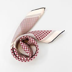 Elevate your style with our Classic Houndstooth silk square scarf, featuring a timeless pattern and hand-rolled hems. Crafted from luxurious silk twill, known for its softness, elegance, breathability, and durability. The deep red, black, and white hues add a touch of sophistication, while the classic houndstooth pattern ensures versatility for any outfit or occasion. Perfect as a refined accessory or a timeless silk anniversary gift for both women and men. Benefits of Wearing Silk Hypoallergeni Luxury Classic Scarves For Women, Luxury Red Elegant Scarves, Luxury Elegant Red Scarves, Classic Luxury Silk Neckwear, Luxury Classic Scarf As Gift, Luxury Classic Silk Neckwear, Luxury Classic Neckwear, Luxury White Silk Scarf Gift, Luxury Classic Black Silk Scarf