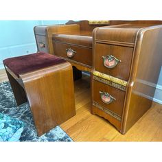 two wooden dressers sitting on top of a hard wood floor next to each other