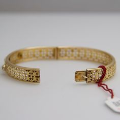 "For sale: (1) d747 Stunning 14k Yellow Gold Diamond Bangle Bracelet PLEASE READ ENTIRE DESCRIPTION BEFORE PURCHASING Pre-owned item. Good condition. Please see pictures for details. Sold as is, as seen on pictures. This bangle is extremely detailed and contains three diamonds. It is not stamped, but has been tested for authenticity. Specifics: 14k Yellow gold Diamonds: 0.30TCW Length: 9 inches Width: 8.8 mm Total Weight: 14 grams Please be 100% sure of your purchase before buying, as we do not Diamond Bangle Bracelet, Diamond Bangles Bracelet, Citrine Ring, Diamond Bangle, Filigree Ring, Ring Photos, Vintage Bracelets, Saint Louis, Stainless Steel Watch