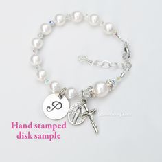 Please let me know the date of the event if applicable in the notes box at checkout. ¸.**'¨) (¸.*'✻ Made with genuine Swarovski crystals and pearls. No seed beads. (¸.*'✻ Celebrate the Baptism of a baby girl with this beautiful all white pearl and sparkly clear crystal rosary bracelet. The bracelet features genuine Swarovski crystals and crystal pearls throughout. The Our Father pearl is surrounded by crystal rhinestone rondelles. (I can also make this with plain clear crystals instead of the sp Baby Girl Baptism Gift, White Rosary, Crystal Rosary, Pearl Rosary, Girl Baptism, Peridot Green, Rosary Bracelet, Baptism Girl