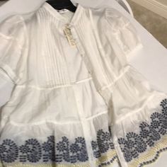 This Delicate Blouse Has Short Sleeves Size Large With Embroidered Bottom Buttons Covered. Tassel Blouse, Tassel Top, Blue Tassel, Covered Buttons, Tassels, Button Down Shirt, Color White, Short Sleeves, Womens Tops