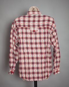 Vintage 80s 90s top. Plaid with some country western style designs. Shoulder padded. CABIN CREEK size - M vintage pre-owned Vintage Relaxed Fit Shirt For Rodeo, Fitted Country Style Tops For Country Events, Vintage Relaxed Fit Tops For Rodeo, Country Style Long Sleeve Top For Country Events, Vintage Cotton Tops For Rodeo, Spring Americana Long Sleeve Tops, Americana Style Cotton Tops For Fall, Plaid Long Sleeve Tops For Ranch, Fitted Plaid Western Tops