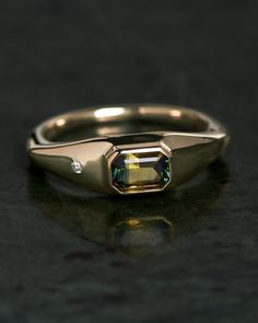 Contemporary ring with emerald cut and brilliant diamond, 14k or 18k yellow gold. Shop bespoke ceremonial, wedding and engagement rings. Man Emerald Ring, Mens Vintage Wedding Ring, Engagement Rings Design Ideas, Emerald Wedding Rings Engagement, Men's Diamond Ring, Men Rings Design, Engagement Rings For Men Gold, Men’s Engagement Ring, Men’s Ring