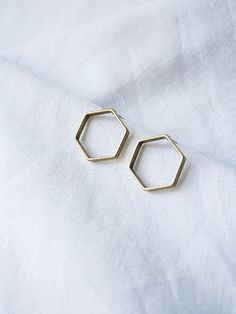 Solid brass hexagon with surgical steel backs and posts. Approx. .75" diameter. Accessorize Bags, Book Clothes, Jewelry Pins, Winter Accessories, Men's Grooming, Accessories Shop, Baby Shop, Solid Brass, Jewelry Earrings