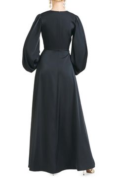 Billowed sleeves add a dramatic touch to this satin gown styled with a sweeping skirt. 62" length V-neck Long sleeves Lined 100% polyester Dry clean Imported Knee Length Evening Dress, Empire Waist Gown, Sachin Babi, Evening Dresses With Sleeves, Black Satin Dress, Long Balloons, Satin Gown, Dress Home, Gowns With Sleeves