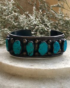 Circa Raw Sleeping Beauty Turquoise Sterling Silver Native American Vintage Antique Cuff Bracelet has lots of beautiful patina Face measures 1 inch wide inner diameter of 6 inches plus a 1/2 inch gap, slightly adjustable Adjustable Turquoise Bangle For Collectors, Adjustable Southwestern Turquoise Cuff Bracelet, Adjustable Turquoise Southwestern Cuff Bracelet, Handmade Turquoise Vintage Cuff Bracelet, Adjustable Turquoise Vintage Bangle, Adjustable Turquoise Bracelet With Patina, Vintage Turquoise Bangle Cuff Bracelet, Adjustable Turquoise Bracelets With Patina, Adjustable Turquoise Cuff Bracelet