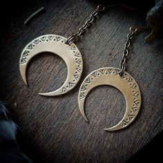 "Brass crescent moon earrings, French artisanal jewelry. Wear jewelry with moons to represent freedom and feminine power. The crescent, symbolizing the re-birth or regeneration aspect of the moon, is the symbol of feminine power and the nature of women. The crescent moon represents the transition from darkness (of the new moon) to light (of the full moon). >>-> DESCRIPTION: The earrings represent crescent moons that I made from a brass plate using traditional jewelry techniques. The entire proce Handmade Artisan Moon-shaped Jewelry, Unique Metal Moon Phase Earrings, Unique Moon Phase Metal Earrings, Artisan Crescent Jewelry Hand Forged, Artisan Hand Forged Crescent Jewelry, Elegant Handmade Half Moon Jewelry, Artisan Hand-forged Crescent Jewelry, Handmade Moon-shaped Metal Hoop Earrings, Handmade Moon-shaped Festival Jewelry