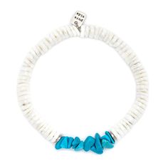 Dress up a classic, beachy look you love with a modern twist when you wear this puka shell and turquoise stretch bracelet from Pura Vida. Ridged turquoise chips add texture and dimension to the bright white puka shell bracelet. Strung on clear, durable wire with stretch, this versatile jewelry will bring a cool and carefree tone to any outfit. | Pura Vida stretch bracelet features puka shell and turquoise beads. | Includes silver metal Pura Vida charm. | 100% waterproof. | 6.25" L White Adjustable Stretch Bracelet With Beachy Style, Adjustable White Stretch Bracelet With Beachy Style, White Adjustable Beachy Stretch Bracelet, White Oyster Bracelet Jewelry For The Beach, White Oyster Bracelet Jewelry For Vacation, White Strand Stretch Bracelet For The Beach, White Beachy Stretch Bracelet For Summer, Beachy White Stretch Bracelet For Vacation, White Heishi Beads Jewelry For Beach Season