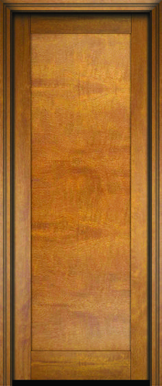 an empty wooden door with black trim