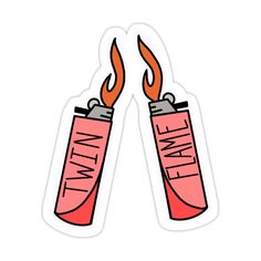 two lighters that are on fire with the words dynamite written in red and white