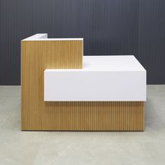 two white and wood benches sitting next to each other