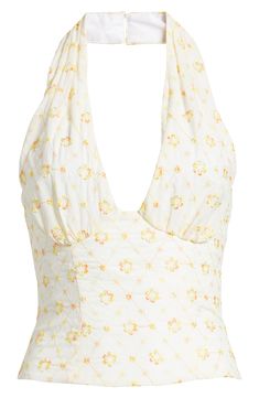 Charming ombré floral embroidery covers this stretch-kissed top designed in a halter silhouette for trendsetting appeal. 8 1/2" length (size Medium) Back button-and-loop closure Halter neck Sleeveless, with cutaway shoulders Lined 95% polyester, 5% elastane Dry clean Imported Chic Fitted Floral Halter Top, Fitted Floral Print Halter Neck Top, Fitted Floral Print Halter Top, Fitted Halter Neck Top With Floral Print, Spring Floral Print V-neck Halter Top, Fitted V-neck Halter Top For Spring, Spring Lace Halter Top, White Floral Print Halter Top, Fitted White Halter Top For Spring