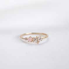 Our feminine Ria Ring features a butterfly design embellished with a pink stone and circle cut crystals on a dainty band.  Main material: Rose Gold, Rhodium, 16k Gold Plated on Brass, Cubic Zirconia Tarnish-resistant protective coating Need some jewelry inspiration? Follow us on Instagram  @statementGrey Promise Rings Danty, Delicate Adjustable Butterfly Promise Ring, Dainty Adjustable Butterfly Promise Ring, Dainty Pink Stackable Rings For Wedding, Delicate Butterfly Ring For Weddings, Dainty Open Butterfly Ring For Promise, Cute Rose Gold Wedding Rings, Dainty Butterfly Ring For Wedding, Pink Open Ring Midi Rings For Wedding