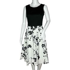 Grace Karin Dress Womens Small Black White Floral Fit & Flare Retro Tea Dress Women’s Size Small Boatneck Sleeveless Vintage Style Tea Dress Midi Length V-Back Hidden Back Zip Cotton Spandex Blend Stretch Classic Preppy Wedding Guest Party Tea Party Afternoon Tea Garden Party Neutral Floralcore Bloomcore Flowercore Measurements Are Approximate: Length 40” Armpit To Armpit 17” Waist 28” New With Tag (1842) Elegant Black And White Midi Dress For Spring, Black And White Midi Dress For Summer Evenings, Black And White Sleeveless Midi Dress For Summer, Casual Black And White Midi Dress For Summer, Black And White Midi Dress For Spring, Black And White Knee-length Midi Dress For Spring, Black And White Knee-length Summer Dresses, Black And White Midi Length Dress, Casual Black And White Dress For Spring