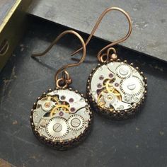 Jane, Vintage Watch Movement Earrings #upcycle #localartist #gothicstyle #gothicfashion #fantasy #vintagejewelry #artjewelry #victorianjewelry #boho #statementjewelry Everyday Silver Copper Earrings, Classic Antique Gold Metal Jewelry, Vintage Single Earring For Everyday, Nickel-free Antique Gold Metal Jewelry, Vintage Single Earring For Everyday Wear, Vintage Gold Stainless Steel Jewelry, Antique Gold Metal Jewelry, Antique Gold Copper Earrings Nickel Free, Everyday Copper Drop Earrings