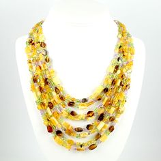 Polish Art Center - "Amber Blend" Artistic Necklace - 18" - 6 Strand Yellow Multi-strand Jewelry Gift, Yellow Multi-strand Jewelry As A Gift, Luxury Multi-strand Necklace For Gift, Handmade Amber Multi-strand Necklace, Luxury Multicolor Single Strand Necklace, Luxury Multicolor Single Strand Necklaces, Yellow Multi-strand Necklace For Gift, Elegant Yellow Multi-strand Necklace, Unique Yellow Jewelry With Gemstone Beads